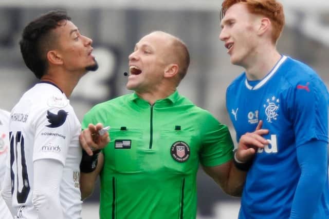 David Bates, right, faces up to Lucca of Corinthians during Rangers' impressive 4-2 win in Florida. Picture: AFP/Getty.