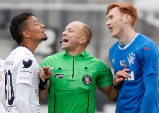 David Bates, right, faces up to Lucca of Corinthians during Rangers' impressive 4-2 win in Florida. Picture: AFP/Getty.