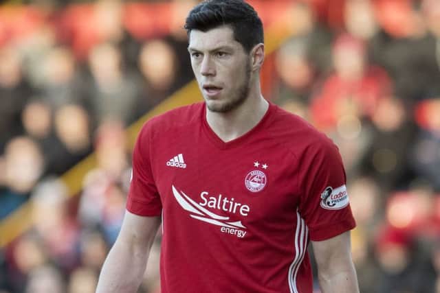 Aberdeen have rejected two bids by Hull city for Scott McKenna. Picture: SNS.