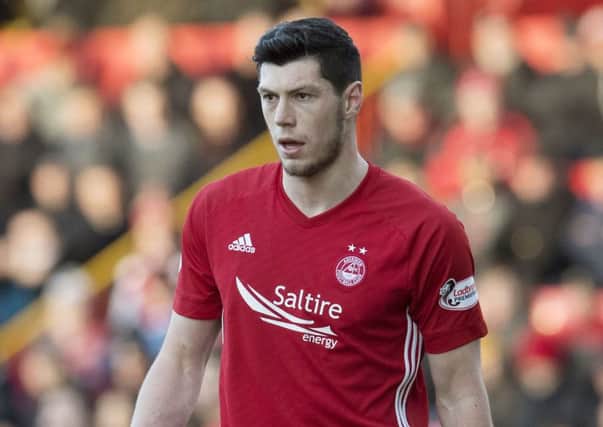 Aberdeen have rejected two bids by Hull city for Scott McKenna. Picture: SNS.