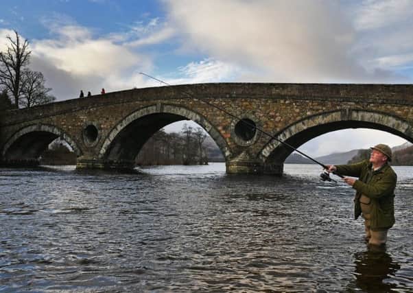 Kenny Docherty casts from the banks of the river Tay. Picture: Jeff J Mitchell/Getty Images