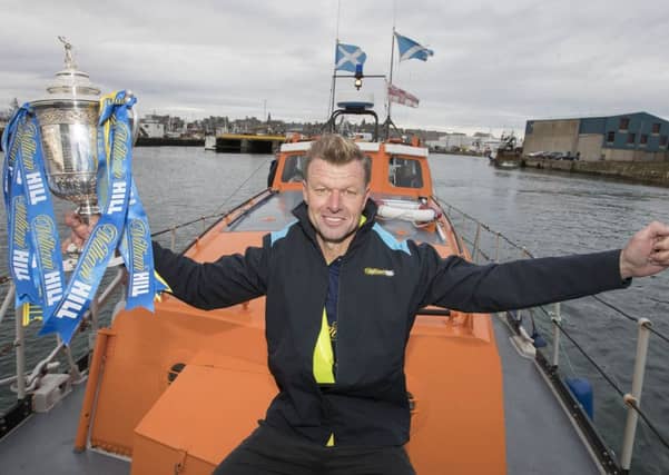 Former Rangers player Arthur Numan on board the Fraserburgh Lifeboat ahead of the William Hill Scottish Cup tie between Rangers and Fraserburgh. Picture: Steve Welsh