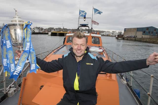 Former Rangers player Arthur Numan on board the Fraserburgh Lifeboat ahead of the William Hill Scottish Cup tie between Rangers and Fraserburgh. Picture: Steve Welsh