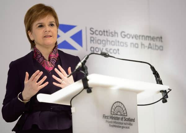 Nicola Sturgeon's concerns about immigration into Scotland should be shared by Theresa May (Picture: AFP/Getty)
