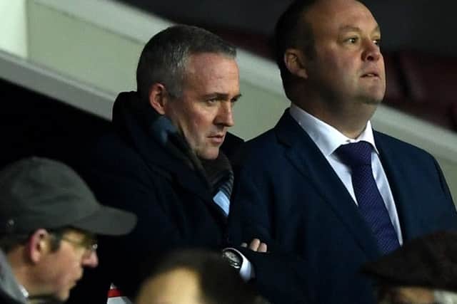 New Stoke manager Paul Lambert watches from the Old Trafford stand last night. Picture: Getty