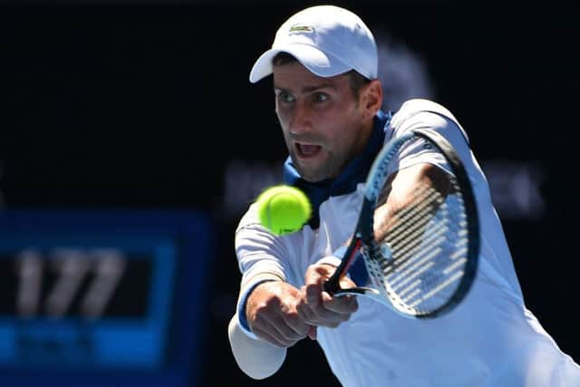 Novak Djokovic in action against Donald Young in the first round of the Australian Open. Picture: AFP/Getty Images