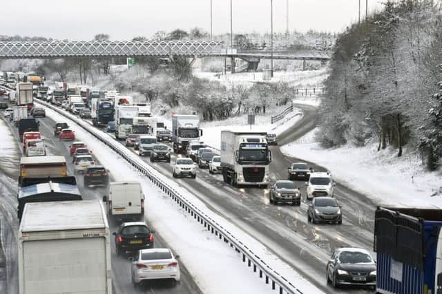 Traffic on a snowy and icy M8, Picture: Lisa Ferguson