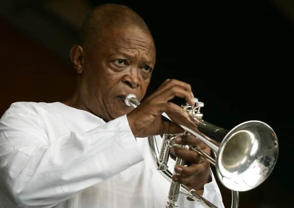 Hugh Masekela performs during the 2006 New Orleans Jazz and Heritage Festival. Picture: AP Photo/Jeff Christensen