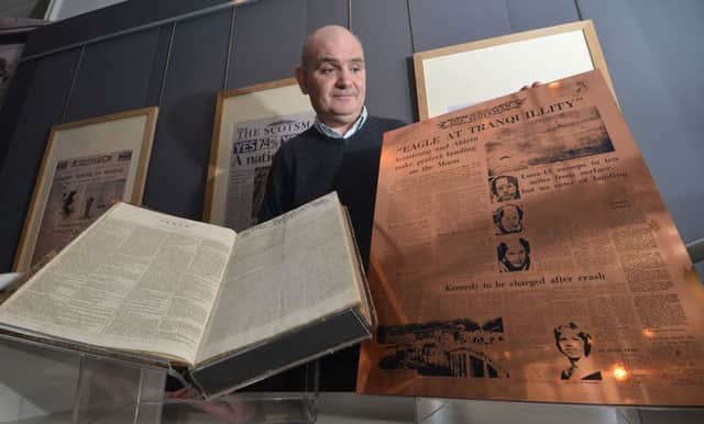 Ian Scott with items from The Scotsman exhibition. Picture: Jon Savage