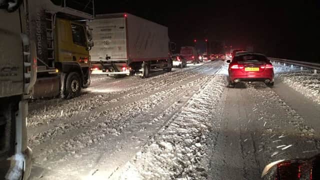 Vehicles are seen stuck in traffic on the M74 in Dumfries and Galloway