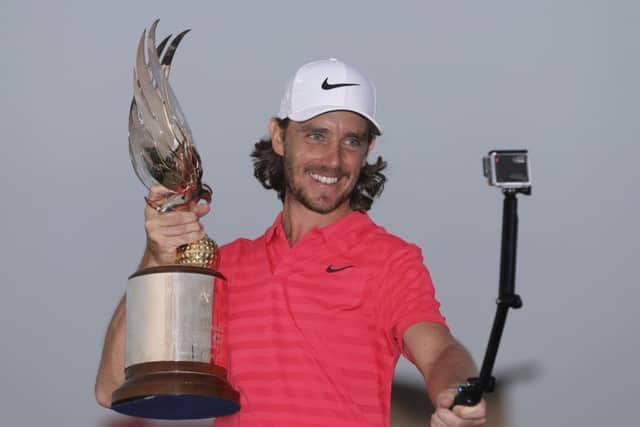 Tommy Fleetwood takes a selfie after retaining the Abu Dhabi HSBC Championship title on Sunday. Picture: AP