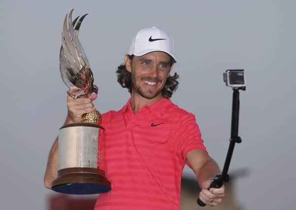 Tommy Fleetwood takes a selfie after retaining the Abu Dhabi HSBC Championship title on Sunday. Picture: AP