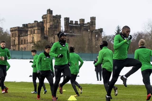 Celtics No 10 Moussa Dembele was all smiles in training at Lennoxtown yesterday but he might not be involved against Partick Thistle tonight. Picture: SNS.