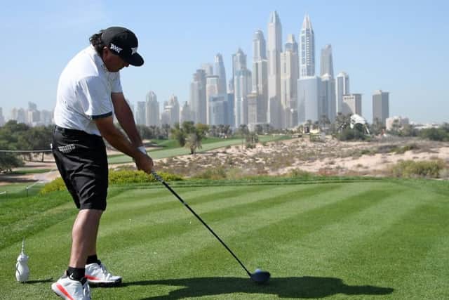 World No 7 tees off at te eighth holes at Emirates Golf Club in a practice round for the Omega Dubai Desert Classic. Picture: Getty Images