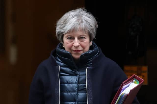 Theresa May has been described as running a "timid" and "dull" administration by her own MPs (Picture: AFP/Getty)