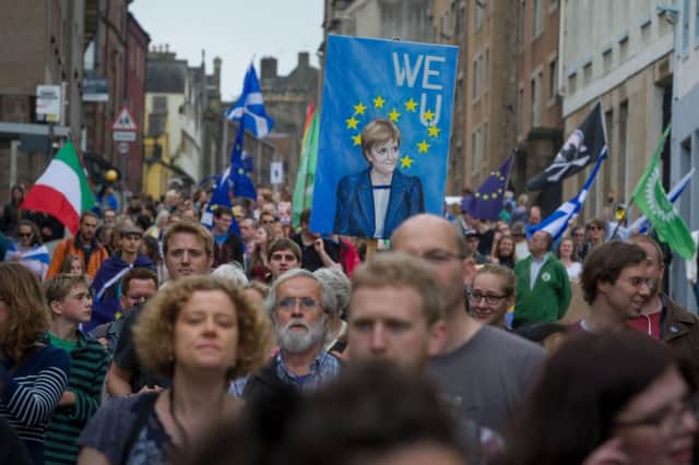 Edinburgh UK Jul 10 2016; Hundreds march on the Scottish parliament in protest at the prospect of Scotland leaving the EU following the referendum. credit steven scott taylor / J P License