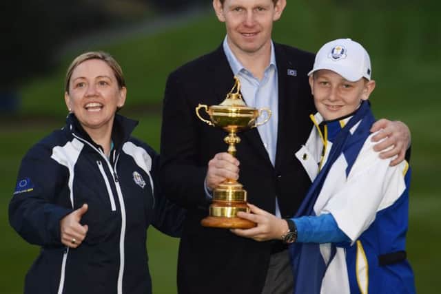 Stephen Gallacher's victory in the 2014 Omega Dubai Desert Classic helped him make the Ryder Cup team at Gleneagles that year. Picture: Ian Rutherford