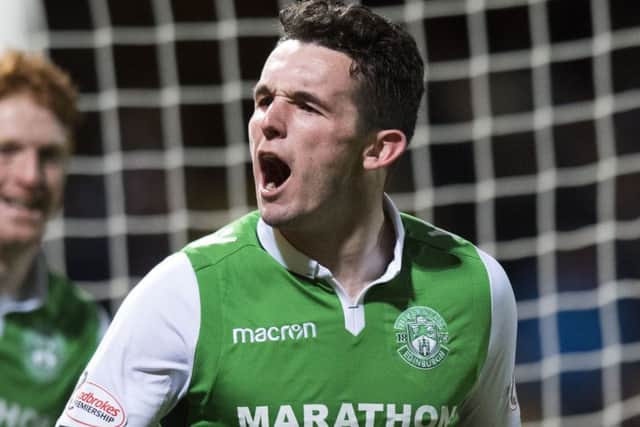 John McGinn celebrates after putting Hibs 1-0 up. Picture: SNS