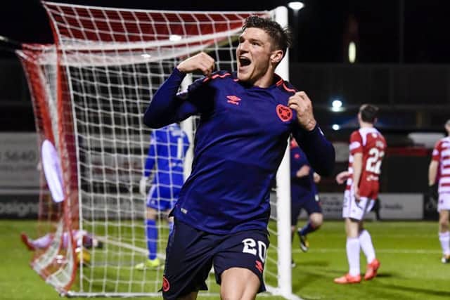 Ross Callachan celebrates having put Hearts 1-0 up. Picture: SNS