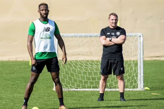 Moussa Dembele and manager Brendan Rodgers. Picture: SNS