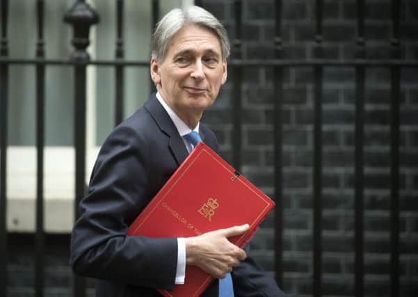 Chancellor Philip Hammond has been making waves in Davos, Picture: Getty Images