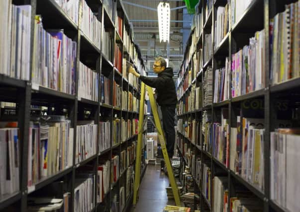 James Hyman in the stacks of his ever growing magazine collection. Picture: Lauren Fleishman/The New York Times