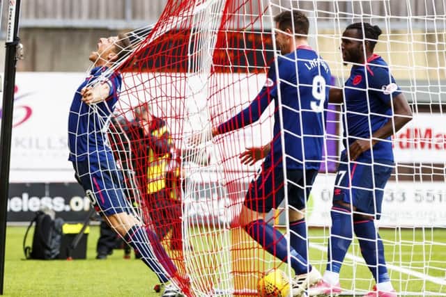 Ross Callachan and Kyle Lafferty, pictured with Esmael Goncalves, were both recruited during the summer. Picture: SNS
