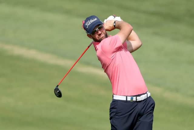 Scott Jamieson on his way to a second-round 70 and a six-under-par halfway total in the Omega Dubai Desert Classic. Picture: Getty Images