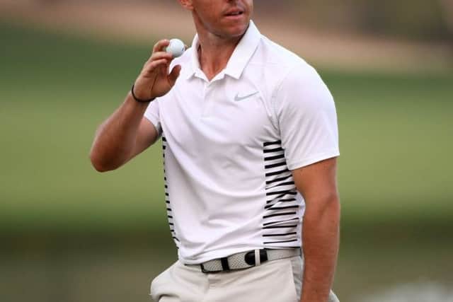Two-time winner acknowledges the crowd after closing with a birdie in the third round of the Omega Dubai Desert Classic. Picture: Getty Images