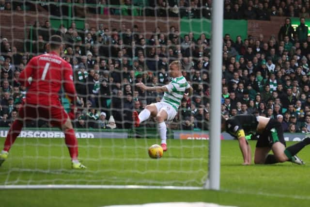Celtic's Leigh Griffiths nets the winner against Hibernian. Picture: Andrew Milligan/PA Wire