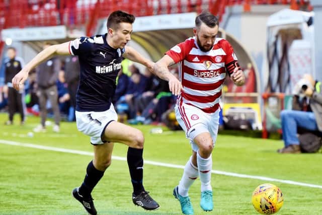 Dundee's Cammy Kerr tussles with Hamilton's Dougie Imrie. Picture: SNS/Ross Parker