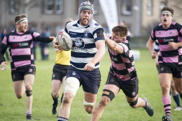 The Heriot's captain Jack Turley runs through to touch down but on this occasion the try was disallowed for a forward pass. Picture: Ian Rutherford