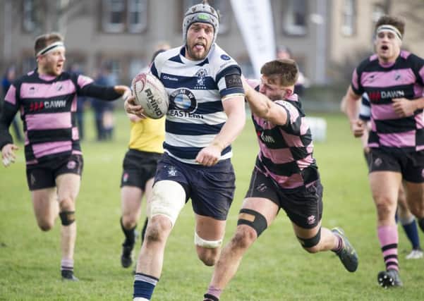 The Heriot's captain Jack Turley runs through to touch down but on this occasion the try was disallowed for a forward pass. Picture: Ian Rutherford