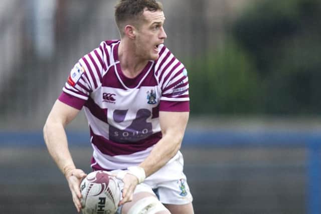Michael Fedo's hat-trick of tries helped Watsonians to a 36-0 win over Hawks. Picture: Graham Stuart/SNS/SRU