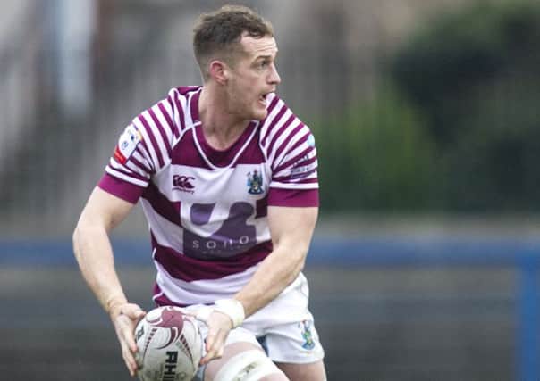 Michael Fedo's hat-trick of tries helped Watsonians to a 36-0 win over Hawks. Picture: Graham Stuart/SNS/SRU