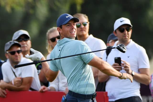 Rory McIlroy reacts to seeing his drive head into the desert at the 16th hole in the final round of the Omega Dubai Desert Classic. Picture: Getty Images