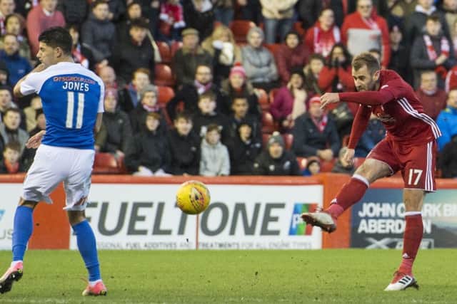 Niall McGinn, after running half the length of the pitch, unleashes a superb strike to put Aberdeen 3-1 ahead. Picture: SNS.