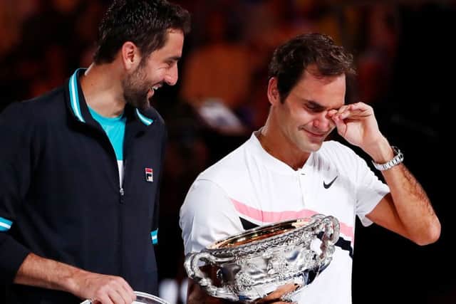 Its all too much for Roger Federer as he breaks down with emotion during the presentation ceremony following his victory over Marin Cilic. Pkicture: Getty.