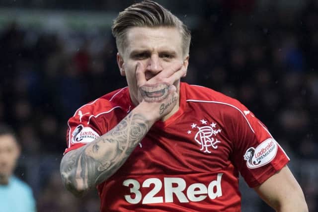 Rangers' Jason Cummings celebrates after scoring to make it 2-0. Picture: SNS