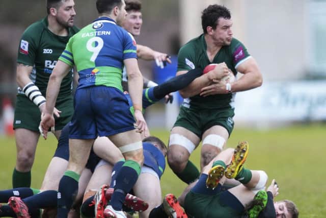 Hardie (right) in action for Hawick before he was forced off after a clash of heads. Picture: SNS Group