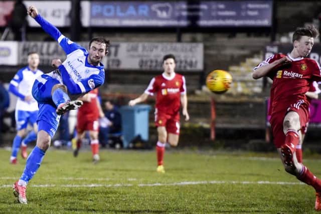 Chris Kane completes his hat-trick by scoring St Johnstones fourth goal against Albion Rovers. Picture: SNS.
