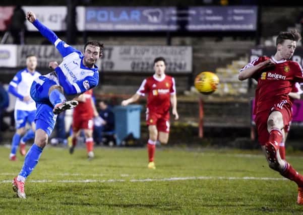 Chris Kane completes his hat-trick by scoring St Johnstones fourth goal against Albion Rovers. Picture: SNS.