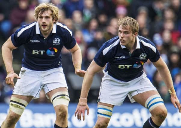 Richie and Jonny Gray in action during Scotlands 27-22 victory over Ireland at Murrayfield last season.