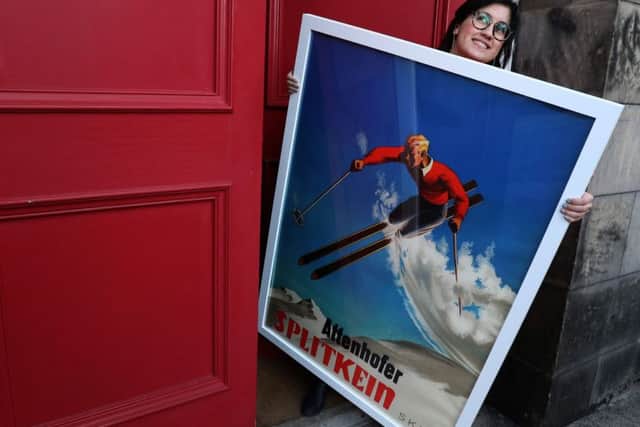 Natasha Muirhead with a lithograph poster called "Splitkein" by Harald Damsleth. Picture: Andrew Milligan/PA Wire