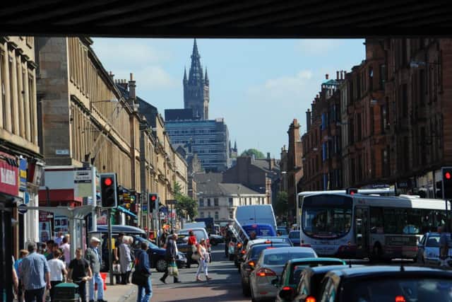 Dumbarton Road is Partick's main artery but suffers from among the worst air pollution in Scotland. Picture: Robert Perry