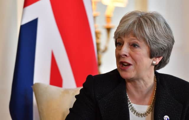 Britain's Prime Minister Theresa May speaks during a meeting in 10 Downing Street this month. Picture: Getty Images