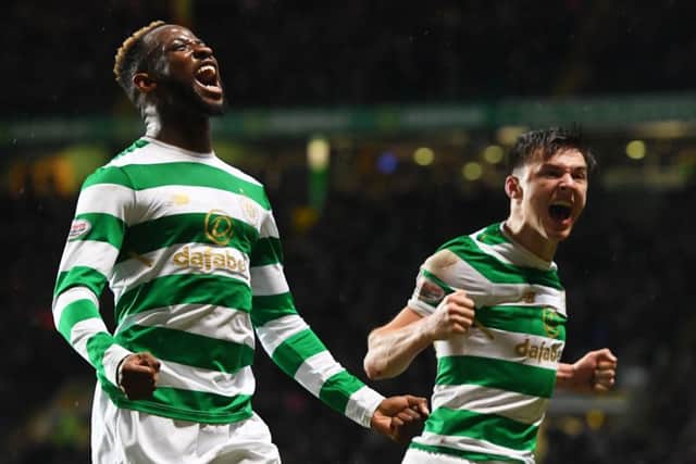 Celtic's Moussa Dembele celebrates his goal with Kieran Tierney. Picture: SNS