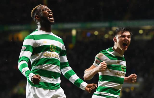Celtic's Moussa Dembele celebrates his goal with Kieran Tierney. Picture: SNS