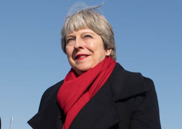 Prime Minister Theresa May has described online intimidation and aggression as a threat to democracy. Picture: PA