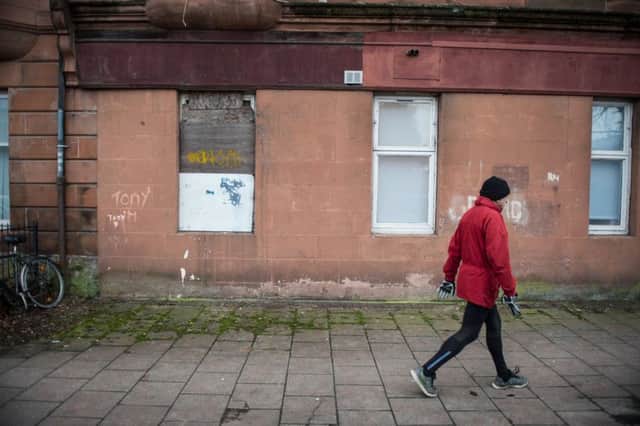While mitigating the policy would cost Â£120 million a year, IPPR Scotland said it would lift 10,000 children and 5,000 adults out of poverty. Picture: John Devlin